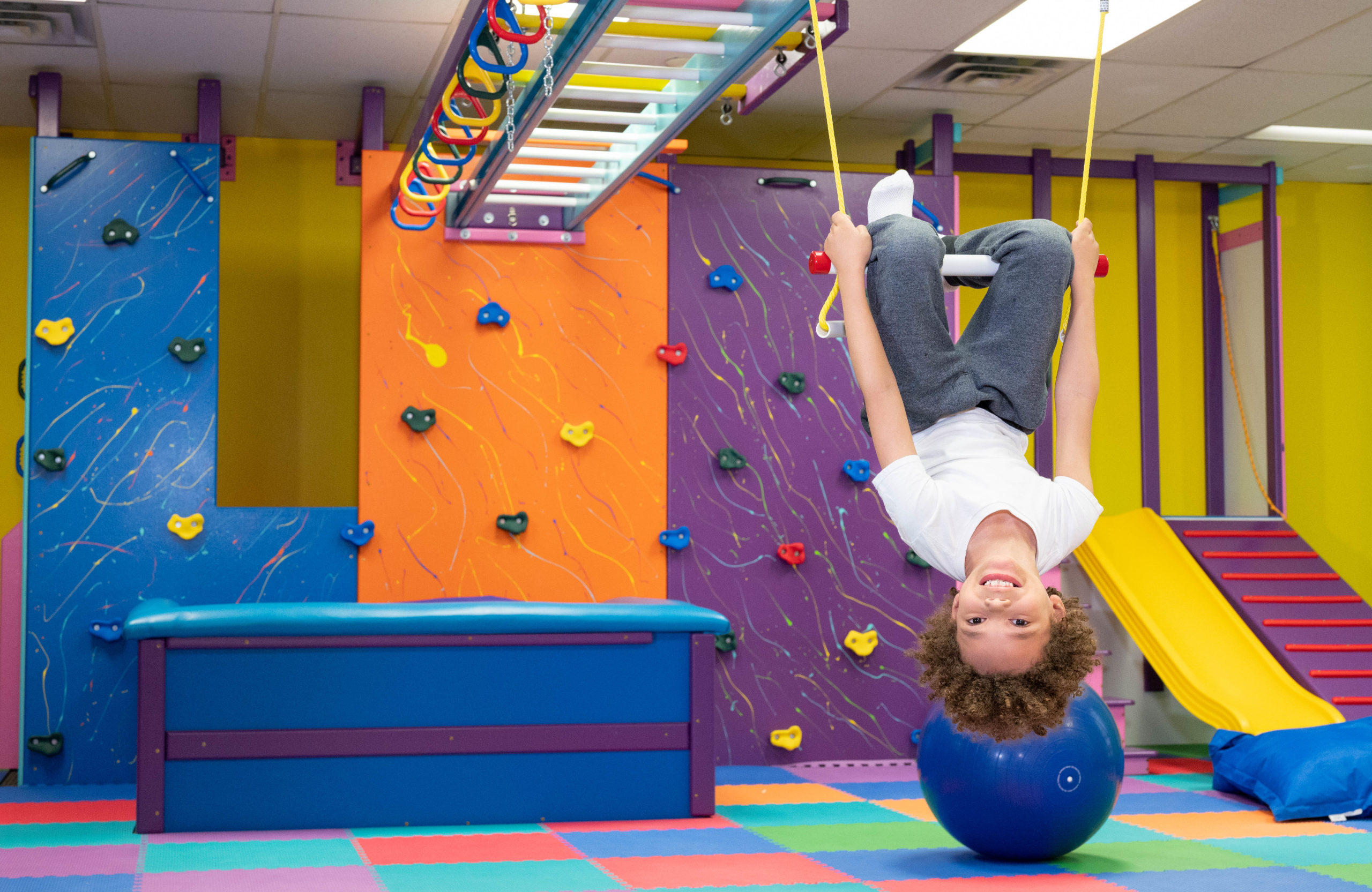 Photo of a child playing in sensory gym
